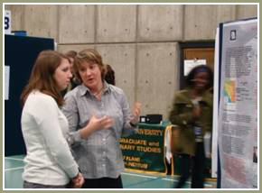 Student presenting their Undergraduate Research at a conference.